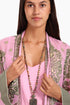 Coat in cotton voile with asymmetric hemline